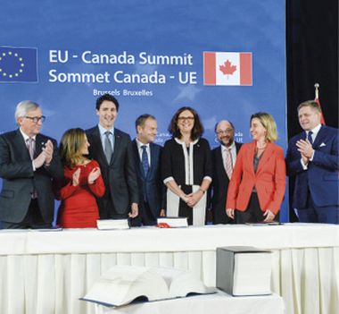 Image: Jean-Claude Juncker, President of the European Commission, Chrystia Freeland, Canadian Minister for International Trade, Justin Trudeau, Prime Minister of Canada, Donald Tusk, President of the European Council, Commissioner Cecilia Malmström, Martin Schulz, President of the European Parliament, High Representative/Commission Vice-President Federica Mogherini and Robert Fico, Prime Minister of Slovakia, at the signing ceremony of the Strategic Partnership Agreement and the Comprehensive Economic and Trade Agreement between the EU and Canada, Brussels, 30 October 2016. © European Union